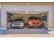 Spacious two car garage with custom paint, ample space for vehicles and tools at 19118 E 54Th Pl, Denver, CO 80249