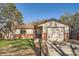Charming single-Gathering home featuring a brick and siding exterior with an attached garage at 2210 S Oakland Way, Aurora, CO 80014