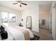 Serene bedroom with a ceiling fan, lots of natural light and comfortable furniture at 3802 Newton, Denver, CO 80211