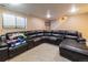 Spacious basement recreation area with sectional sofa at 18360 E Ithaca Pl, Aurora, CO 80013