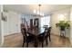 Spacious dining area with hardwood floors and view of stairs at 18360 E Ithaca Pl, Aurora, CO 80013