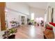 Spacious living room with hardwood floors and large windows at 18360 E Ithaca Pl, Aurora, CO 80013