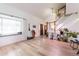 Bright living room with hardwood floors and a window seat at 18360 E Ithaca Pl, Aurora, CO 80013