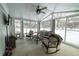 Sunroom with seating area and views of backyard at 18360 E Ithaca Pl, Aurora, CO 80013