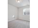 Unfinished basement room with carpet and window at 24540 E 36Th Ave, Aurora, CO 80019