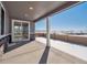 Covered patio with a view of the backyard and surrounding neighborhood at 24540 E 36Th Ave, Aurora, CO 80019