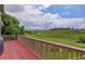 Spacious deck offering scenic views of the surrounding lush green landscape at 10609 Chadsworth Ln, Highlands Ranch, CO 80126