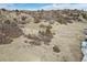 Elevated lot view of property that has surrounding acres of natural vegetation, with a stream at 4249 Oak Grove Way, Castle Rock, CO 80108