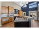 Kitchen with built in appliances and kitchen island at 4249 Oak Grove Way, Castle Rock, CO 80108
