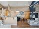 Spacious living room featuring wood floors, fireplace, and natural light at 4249 Oak Grove Way, Castle Rock, CO 80108