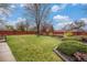 Backyard features landscaping and grass at 6613 Independence St, Arvada, CO 80004