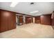 Spacious finished basement with a piano at 6613 Independence St, Arvada, CO 80004