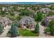Aerial view of the property showcasing its location, landscaping, and neighborhood at 9121 Sunshine Meadow Pl, Parker, CO 80134