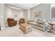 A comfortable seating area in the basement offers a relaxing space with a sofa and two armchairs at 9121 Sunshine Meadow Pl, Parker, CO 80134