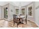 Inviting breakfast nook with natural light, shutters, and view to the yard at 9121 Sunshine Meadow Pl, Parker, CO 80134