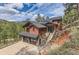 Beautiful two-story home features a two car garage, solar panels, and mountain views at 795 Pine Brook Rd, Boulder, CO 80304
