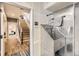 Industrial laundry room featuring metal sink, stairs to the main floor, and modern decor at 795 Pine Brook Rd, Boulder, CO 80304