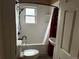 Bathroom featuring a shower-tub combo and modern fixtures at 1985 Blackhawk St, Aurora, CO 80011