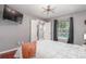 Cozy bedroom with a view of the pool and direct access to another area in the house at 8360 W 87Th Dr # D, Arvada, CO 80005