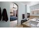 Elegant bathroom with a fireplace and views to the bedroom at 10127 Bluffmont Ln, Lone Tree, CO 80124