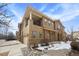 Beautiful townhome featuring an attached garage, stucco exterior, and private balcony at 10127 Bluffmont Ln, Lone Tree, CO 80124