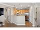 Inviting kitchen space boasting modern stainless steel appliances and warm wood cabinetry at 10127 Bluffmont Ln, Lone Tree, CO 80124