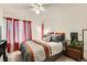 Cozy bedroom with soft lighting and decorative accents, offering a relaxing and comfortable ambiance at 20000 Mitchell Pl # 51, Denver, CO 80249