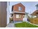Charming brick two-story home with well-maintained lawn and inviting front entrance at 6926 Kendrick Ln, Arvada, CO 80007