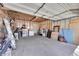 Spacious garage interior with concrete floor and ample space for storage and projects at 54 S Emerson St # 4, Denver, CO 80209