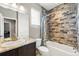 Bathroom showcasing modern tiling and fixtures and a shower/tub combination at 18083 Telford Ave, Parker, CO 80134