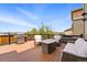 Relax on the spacious deck with outdoor seating and a grill, perfect for entertaining at 18083 Telford Ave, Parker, CO 80134