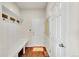 Functional mud room with bench, hooks, and ample storage near the entrance at 5722 S Flat Rock Way, Aurora, CO 80016