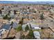 Neighborhood aerial shot featuring the house amongst tree-lined streets and other residences at 1130 S Harrison St, Denver, CO 80210