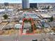 An aerial view shows home in residential neighborhood, near bus line, businesses and shopping centers at 1130 S Harrison St, Denver, CO 80210