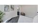 Bright bedroom featuring neutral walls, modern art, and a cozy sitting area, promoting a relaxing atmosphere at 1130 S Harrison St, Denver, CO 80210