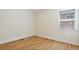 Empty bedroom with hardwood floors at 1130 S Harrison St, Denver, CO 80210
