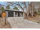 Charming home with a well-maintained lawn, modern garage door, and inviting entrance at 1130 S Harrison St, Denver, CO 80210