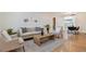 Cozy living room showcasing stylish decor, hardwood floors, and a comfortable seating area at 1130 S Harrison St, Denver, CO 80210