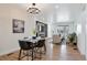 Open-concept dining and living area with stylish furnishings at 1130 S Harrison St, Denver, CO 80210