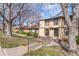 Inviting two-story home with a wreath on the front door and trees at 3512 S Kittredge St # C, Aurora, CO 80013