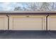 One-car garage door with a white exterior at 3512 S Kittredge St # C, Aurora, CO 80013