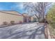 Parking area with a shared driveway and a view of some of the surrounding neighborhood at 3512 S Kittredge St # C, Aurora, CO 80013