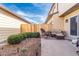 Back patio with outdoor seating and garden bed at 3512 S Kittredge St # C, Aurora, CO 80013