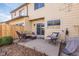 Back patio with outdoor furniture and a wooden fence at 3512 S Kittredge St # C, Aurora, CO 80013