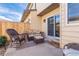 Back patio featuring outdoor furniture and a sliding glass door entrance at 3512 S Kittredge St # C, Aurora, CO 80013