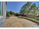 Paver patio and landscaped backyard is perfect for outdoor enjoyment at 8416 S Reed St, Littleton, CO 80128
