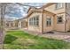 Well-maintained backyard featuring lush green grass, perfect for outdoor relaxation and entertaining at 3522 Harvard Pl, Broomfield, CO 80023