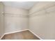 This walk-in closet features sturdy wire shelving and a carpeted floor, making organization a breeze at 3522 Harvard Pl, Broomfield, CO 80023