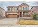 Charming two-story home with a well-maintained front lawn and attached two-car garage at 3522 Harvard Pl, Broomfield, CO 80023
