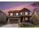 Charming two-story home with a well-maintained front lawn and attached two-car garage at 3522 Harvard Pl, Broomfield, CO 80023